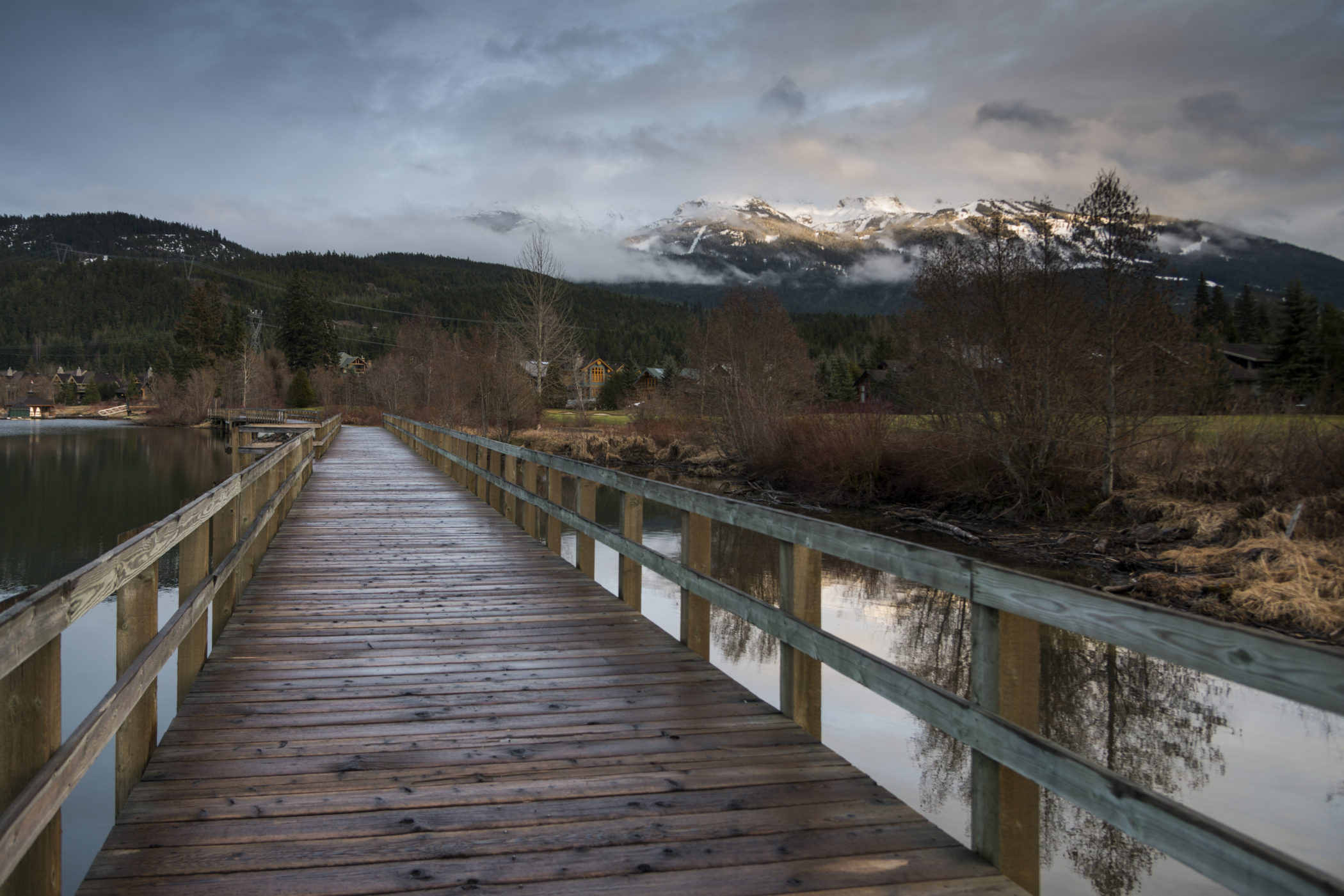 Wooden footbridge over river, Whistler, British Columbia, Canada